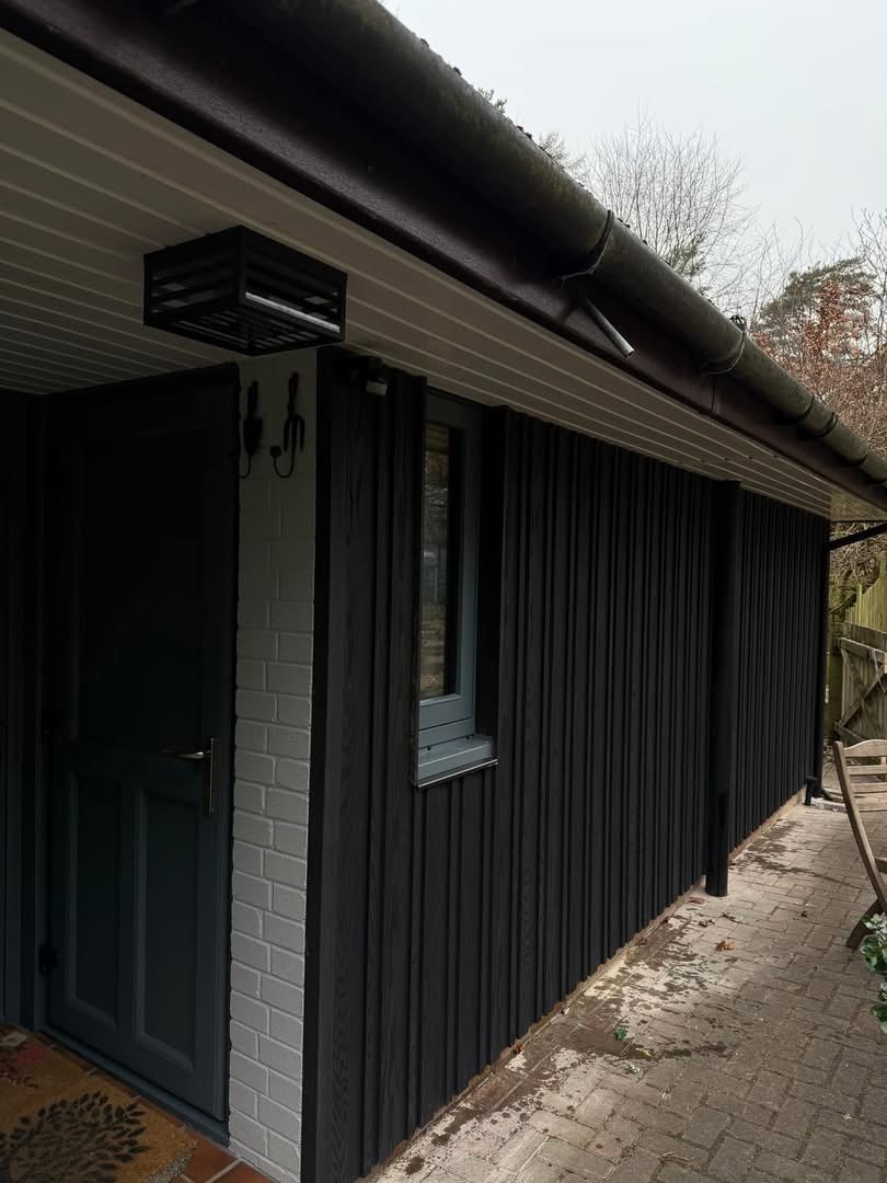 Architectural wall cladding Carlisle - Millboard composite cladding installation Cumbria - modern garden design North West UK